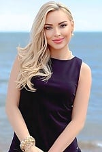 Ukrainian mail order bride Olga from Lviv with blonde hair and green eye color - image 4