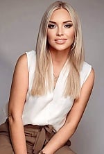 Ukrainian mail order bride Olga from Lviv with blonde hair and green eye color - image 2