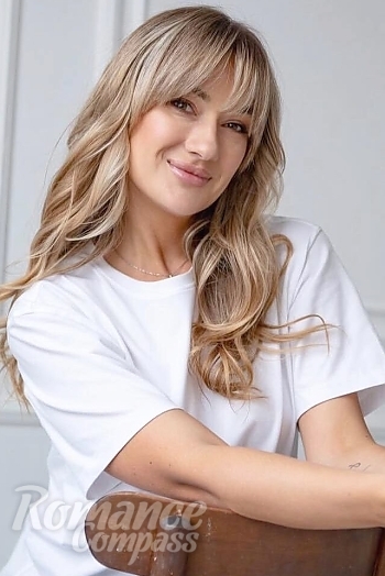 Ukrainian mail order bride Maria from Rome with blonde hair and brown eye color - image 1