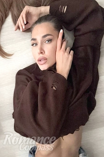 Ukrainian mail order bride Alina from Odesa with light brown hair and green eye color - image 1