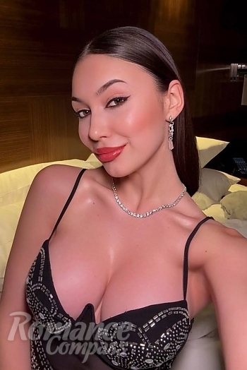 Ukrainian mail order bride Tetiana from Chicago with black hair and blue eye color - image 1