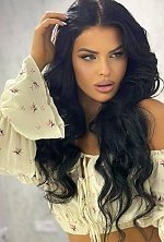 Ukrainian mail order bride Ksenia from Rivne with black hair and green eye color - image 6