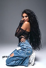 Ukrainian mail order bride Ksenia from Rivne with black hair and green eye color - image 10