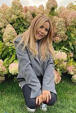 Ukrainian mail order bride Aigerim from Almaty with blonde hair and brown eye color - image 9