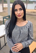 Ukrainian mail order bride Magali from Paraná with black hair and green eye color - image 4