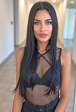 Ukrainian mail order bride Magali from Paraná with black hair and green eye color - image 5