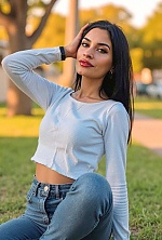 Ukrainian mail order bride Magali from Paraná with black hair and green eye color - image 24