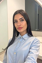 Ukrainian mail order bride Magali from Paraná with black hair and green eye color - image 33