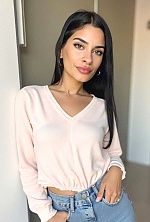 Ukrainian mail order bride Magali from Paraná with black hair and green eye color - image 13