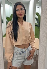 Ukrainian mail order bride Magali from Paraná with black hair and green eye color - image 29