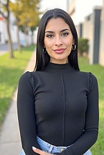 Ukrainian mail order bride Magali from Paraná with black hair and green eye color - image 15