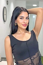 Ukrainian mail order bride Magali from Paraná with black hair and green eye color - image 16