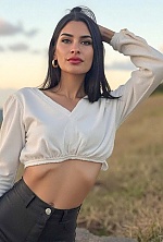 Ukrainian mail order bride Magali from Paraná with black hair and green eye color - image 32