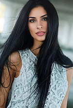 Ukrainian mail order bride Magali from Paraná with black hair and green eye color - image 20