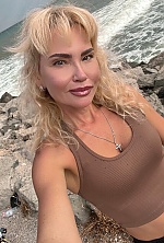 Ukrainian mail order bride Lyudmila from Paris with blonde hair and green eye color - image 11