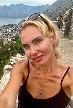 Ukrainian mail order bride Lyudmila from Paris with blonde hair and green eye color - image 17