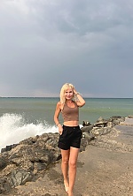 Ukrainian mail order bride Lyudmila from Paris with blonde hair and green eye color - image 13