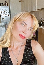 Ukrainian mail order bride Lyudmila from Paris with blonde hair and green eye color - image 15