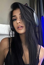 Ukrainian mail order bride Anastasia from Kyiv with black hair and brown eye color - image 7