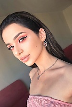 Ukrainian mail order bride Anastasia from Kyiv with black hair and brown eye color - image 2