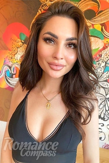 Ukrainian mail order bride Alona from Kryvyi Rih with black hair and brown eye color - image 1