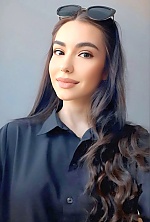 Ukrainian mail order bride Kseniia from Kyiv with black hair and black eye color - image 7