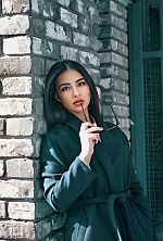 Ukrainian mail order bride Kseniia from Kyiv with black hair and black eye color - image 8