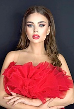 Ukrainian mail order bride Sonaxanim from Baku with light brown hair and green eye color - image 3