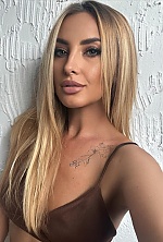 Ukrainian mail order bride Yana from Kyiv with blonde hair and green eye color - image 11