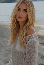 Ukrainian mail order bride Yana from Kyiv with blonde hair and green eye color - image 6