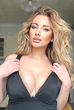 Ukrainian mail order bride Yana from Kyiv with blonde hair and green eye color - image 26