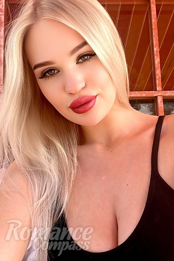 Ukrainian mail order bride Olga from Kryvyi Rih with blonde hair and green eye color - image 1