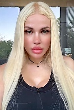Ukrainian mail order bride Natalia from Warsaw with blonde hair and hazel eye color - image 5