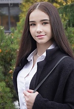 Ukrainian mail order bride Vladislava from Kyiv with black hair and hazel eye color - image 9