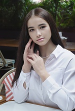 Ukrainian mail order bride Vladislava from Kyiv with black hair and hazel eye color - image 2