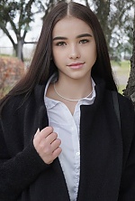 Ukrainian mail order bride Vladislava from Kyiv with black hair and hazel eye color - image 5