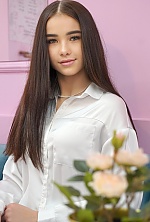 Ukrainian mail order bride Vladislava from Kyiv with black hair and hazel eye color - image 7
