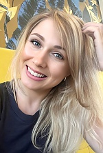 Ukrainian mail order bride Yuliia from Sumy with blonde hair and green eye color - image 2