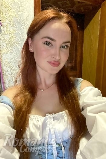 Ukrainian mail order bride Karina from Sumy with red hair and hazel eye color - image 1