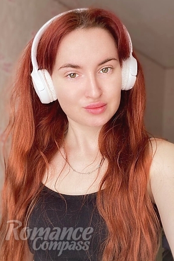 Ukrainian mail order bride Karina from Sumy with red hair and hazel eye color - image 1