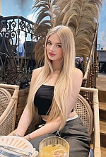 Ukrainian mail order bride Anastasiia from Kyiv with blonde hair and blue eye color - image 4