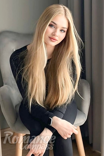 Ukrainian mail order bride Anastasiia from Kyiv with blonde hair and blue eye color - image 1