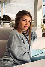 Ukrainian mail order bride Olena from Odesa with light brown hair and green eye color - image 20