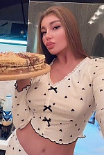 Ukrainian mail order bride Olena from Odesa with light brown hair and green eye color - image 15