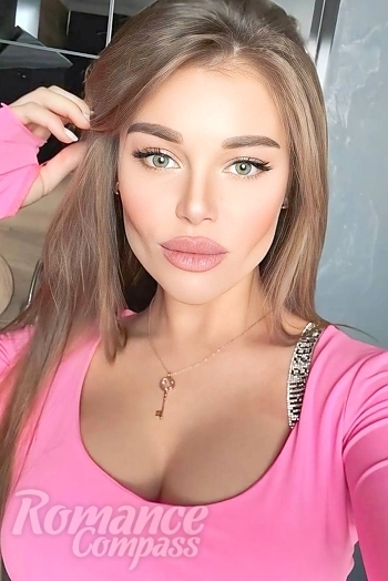 Ukrainian mail order bride Olena from Odesa with light brown hair and green eye color - image 1