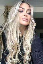 Ukrainian mail order bride Olga from Kropyvnytskyi with blonde hair and green eye color - image 10