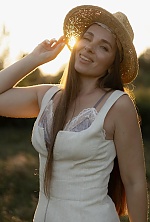 Ukrainian mail order bride Yana from Zhytomyr with light brown hair and green eye color - image 9