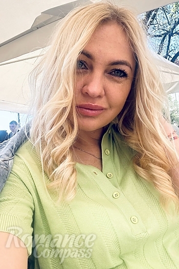 Ukrainian mail order bride Olesya from Ternopil with blonde hair and blue eye color - image 1
