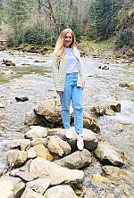 Ukrainian mail order bride Olesya from Ternopil with blonde hair and blue eye color - image 8