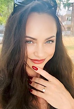 Ukrainian mail order bride Ludmila from Chisinau with black hair and blue eye color - image 6